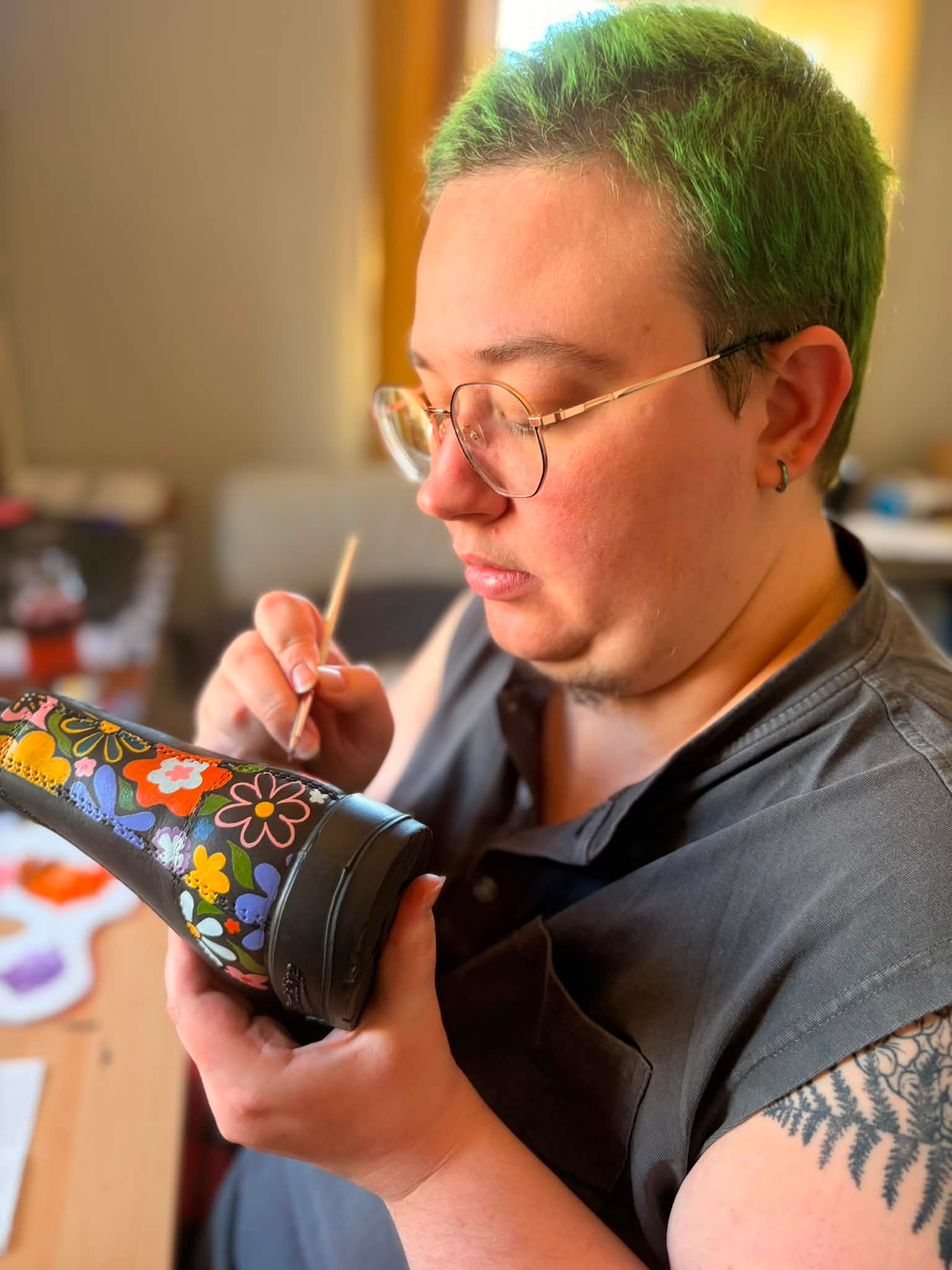 Are these the most amazing boots or what?! 🥾🎨🧑‍🎨🫟🇳🇴

I commissioned my eldest, Hope, to jazz up boots I’ll be taking to Norway on our trip this fall and WOWZA! 

They helped me pick the design and colors and placement on the boots, and kept me posted every step of the way. 

The paint is specially made for leather with a protective topcoat. 

Today, Hope explained, while completing the finishing touches, that each color in this particular design has a little bit of orange in it to pull it altogether! 🧡

I see Hope’s art degree shining through in these moments but moreover, their incredible eye for balance and creativity in art! 🖼️ 

It’s such a joy to support original art (and one of my children at the same time)! 

#blundstoneboots
#originalart
#proudmama ￼￼￼
#makelifemattermore
￼￼￼￼